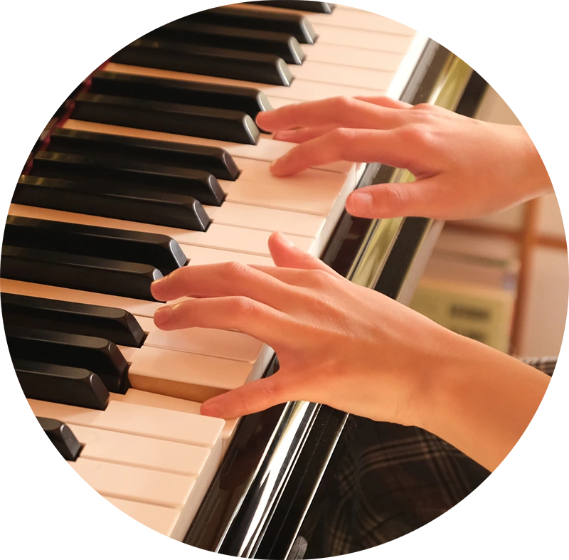 Student playing piano