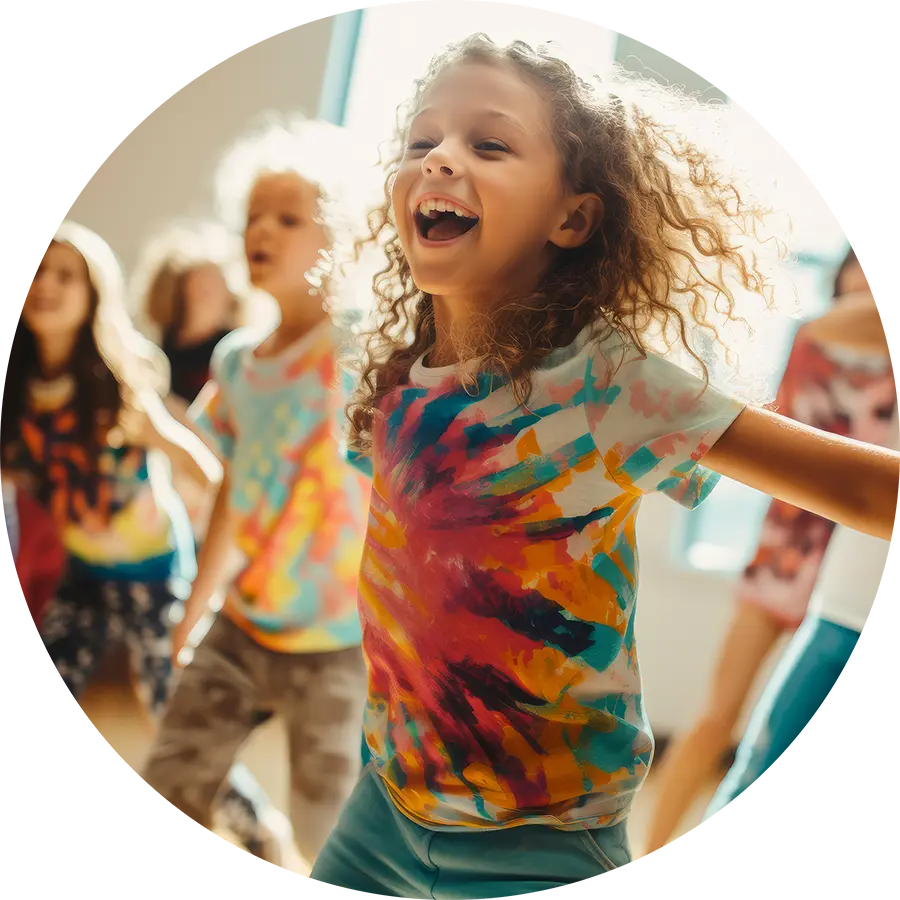 Happy kids dancing and participating in creative summer camp activities