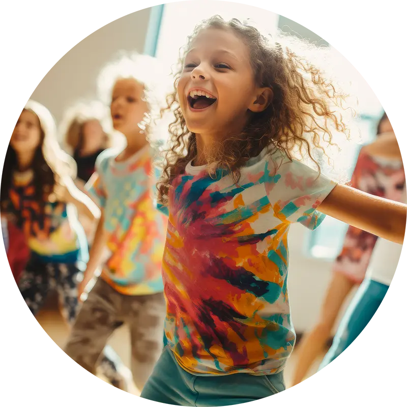 Happy kids dancing and participating in creative summer camp activities
